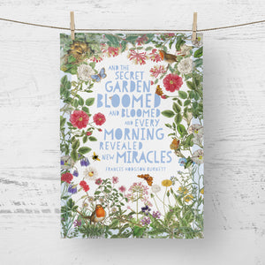 Tea towel The Secret Garden with flower border, Robin, and hidden key...