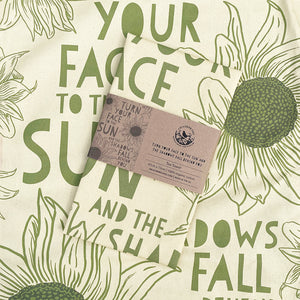 Tea towel - Turn your face to the sun and the shadows fall behind you